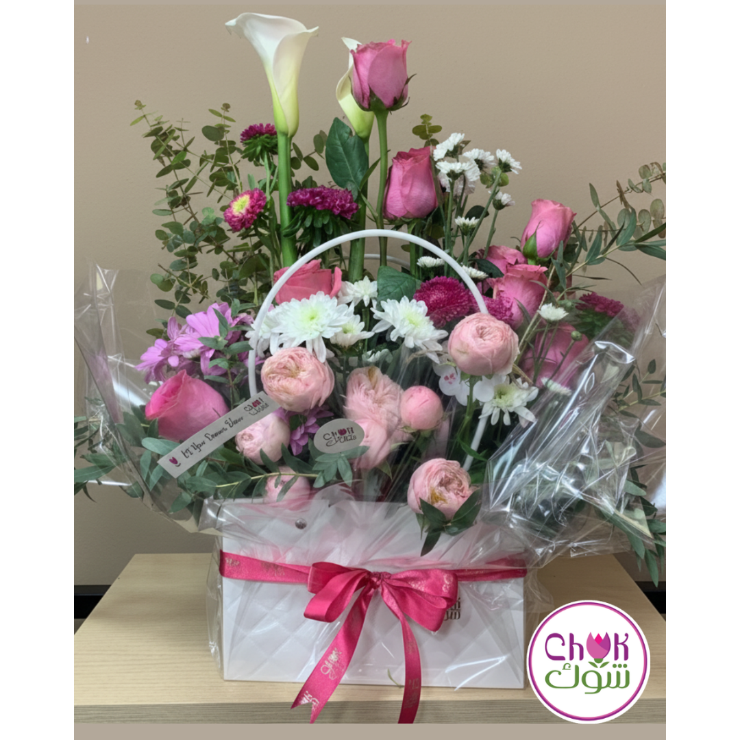 Fresh Spring Flowers in a White Bag